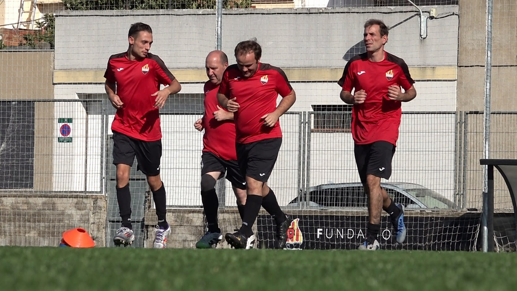 Jugadors del Reus Genuine escalfant durant un entrenament de pretemporada